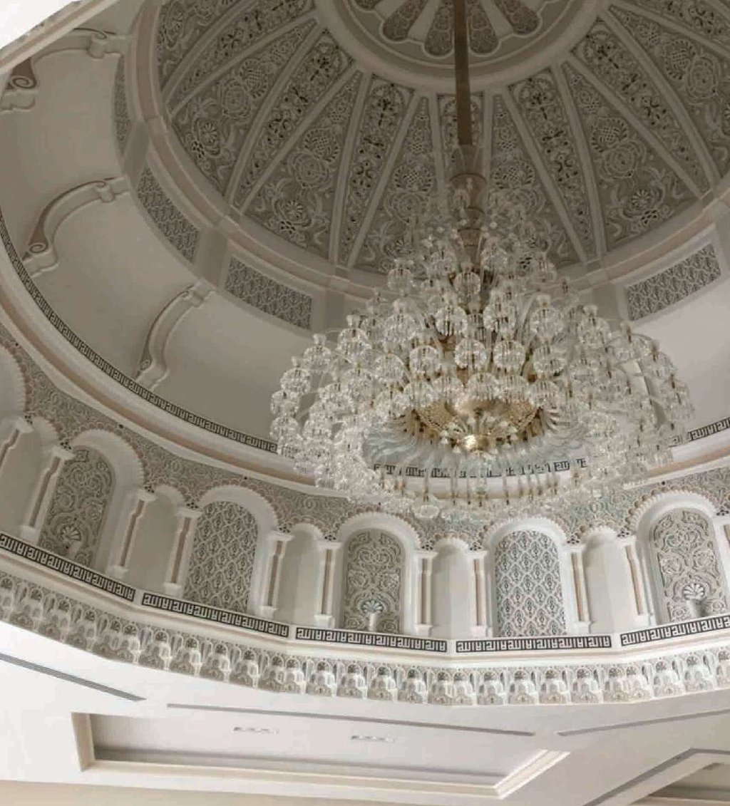 Decorative gypsum dome with chandelier at Al Hamiri Mosque in Al Ain, UAE